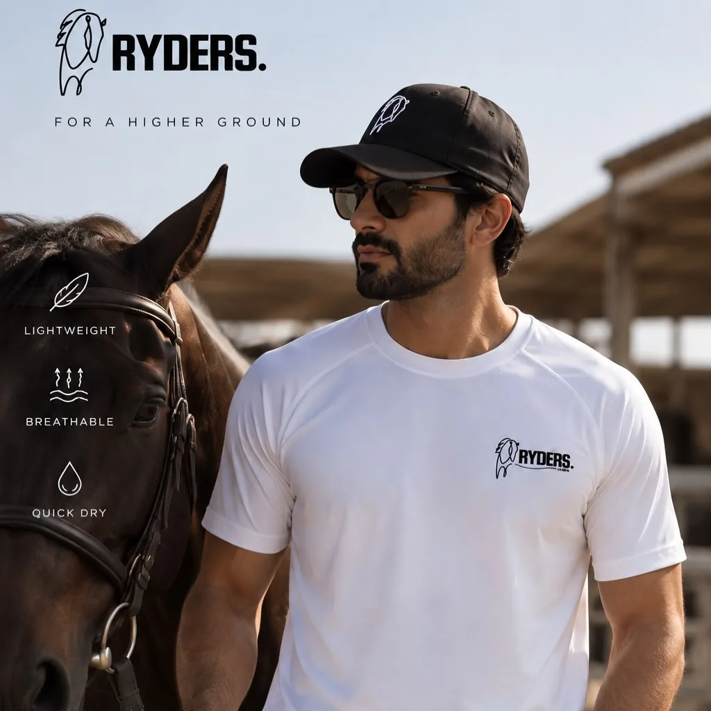 A rider in the RYDERS performance tee beside his horse